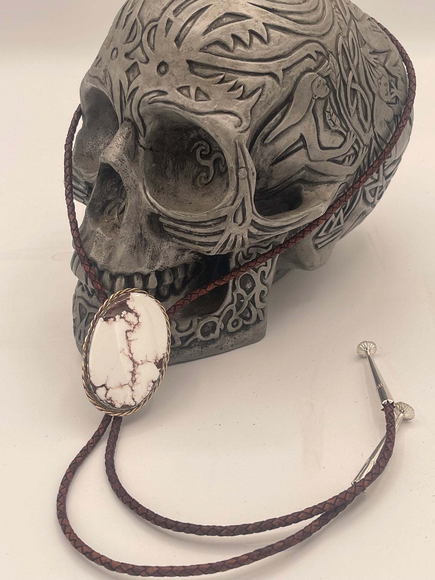White Buffalo Turquoise Bolo Tie with Gold Wrap and Sterling Silver Mount